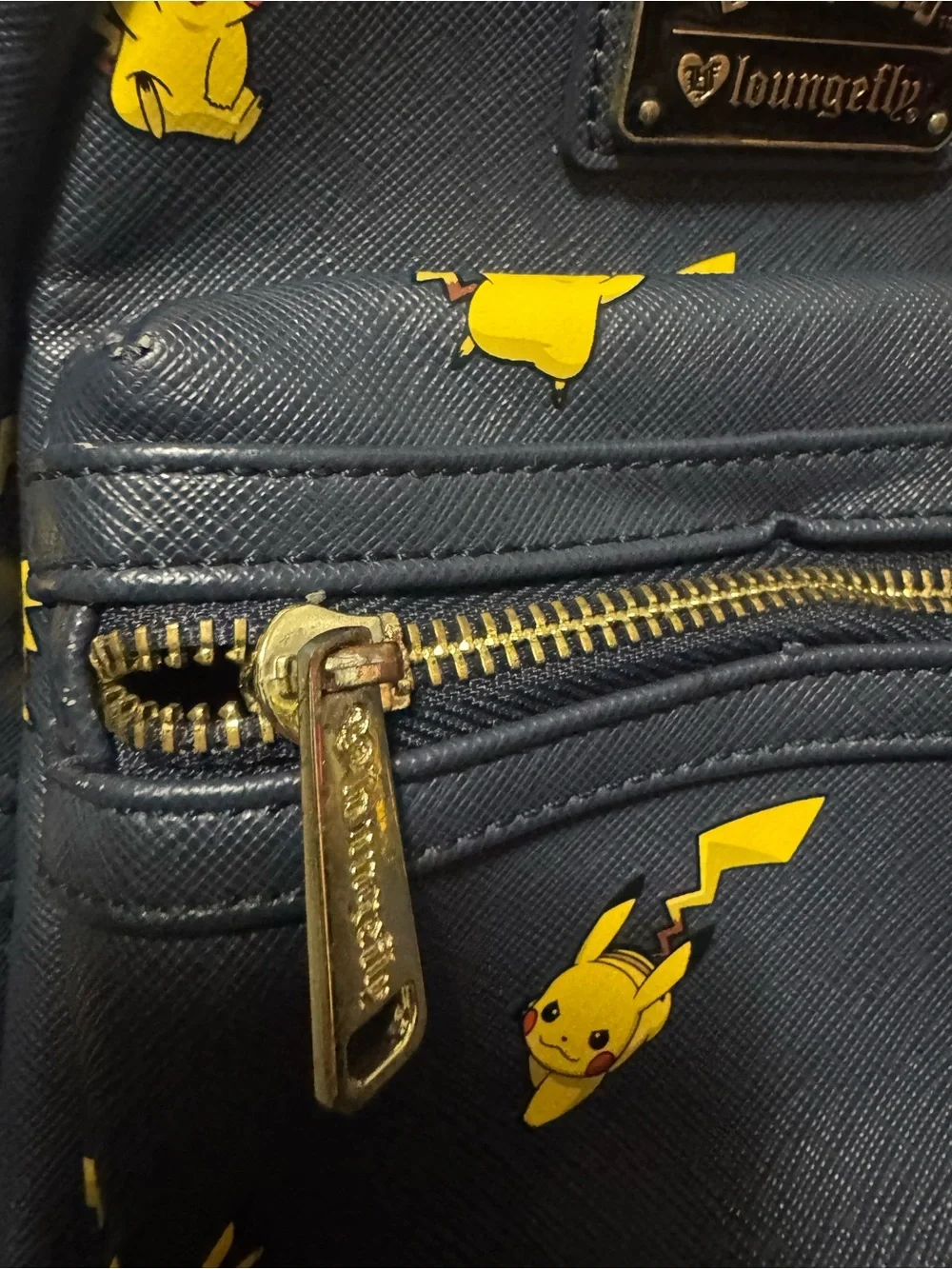 Loungefly Navy Mini Backpack with Yellow Pikachu Print